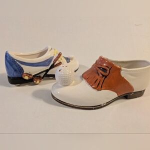 Vintage golf shoe figurines.